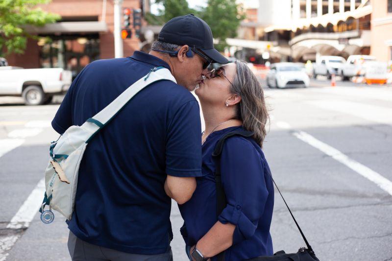 Mo and Hector kissing in downtown Spokane, WA
