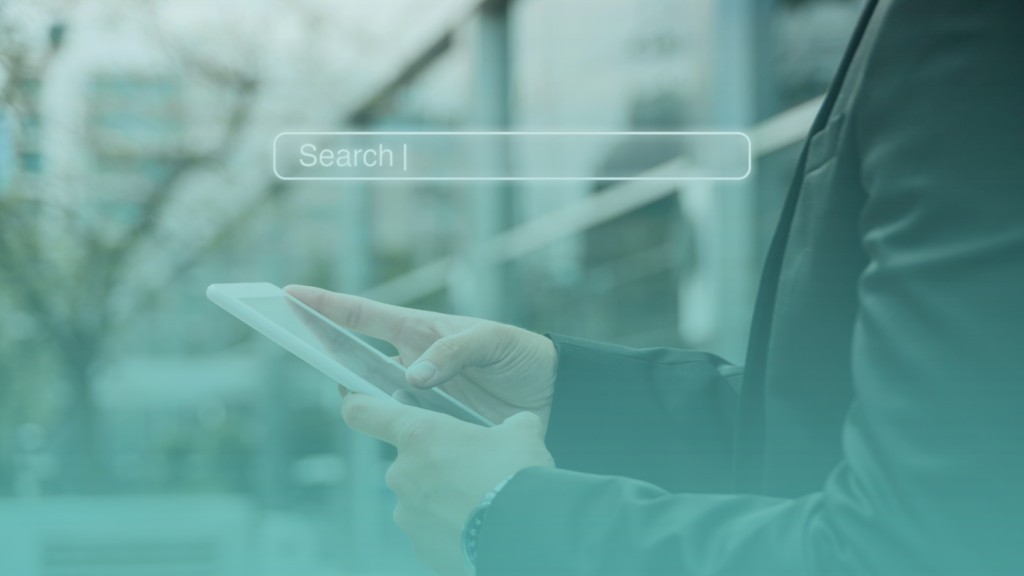 Commercial real estate professional using online search, representing AI search visibility for CRE brokers