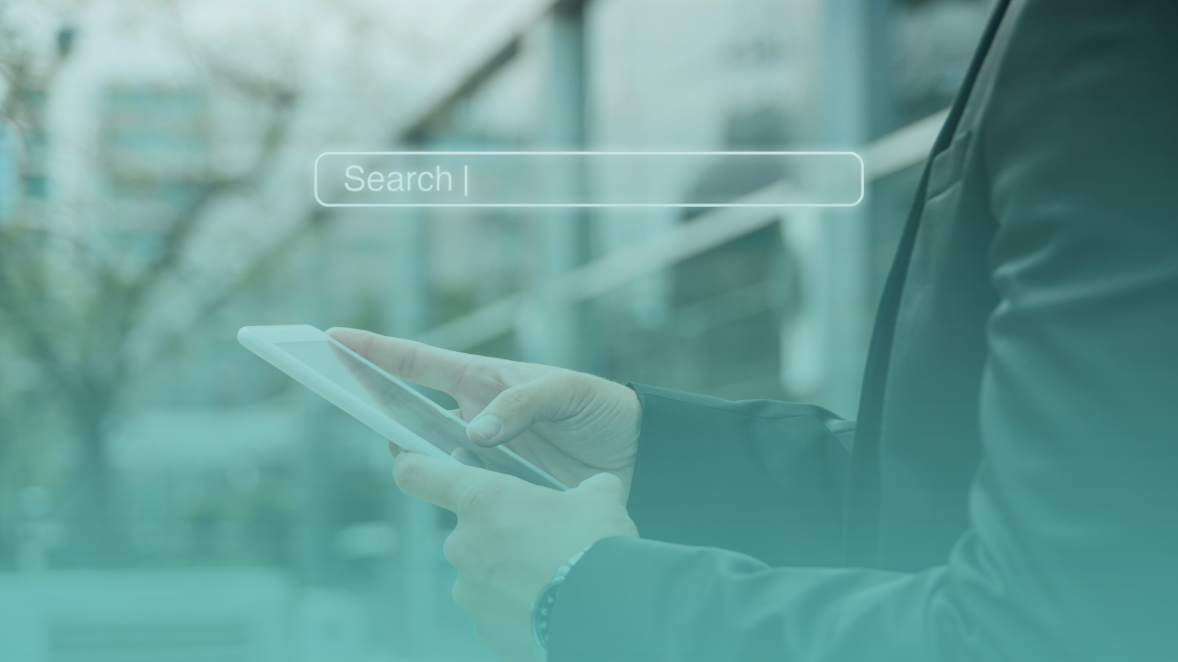 Commercial real estate professional using online search, representing AI search visibility for CRE brokers