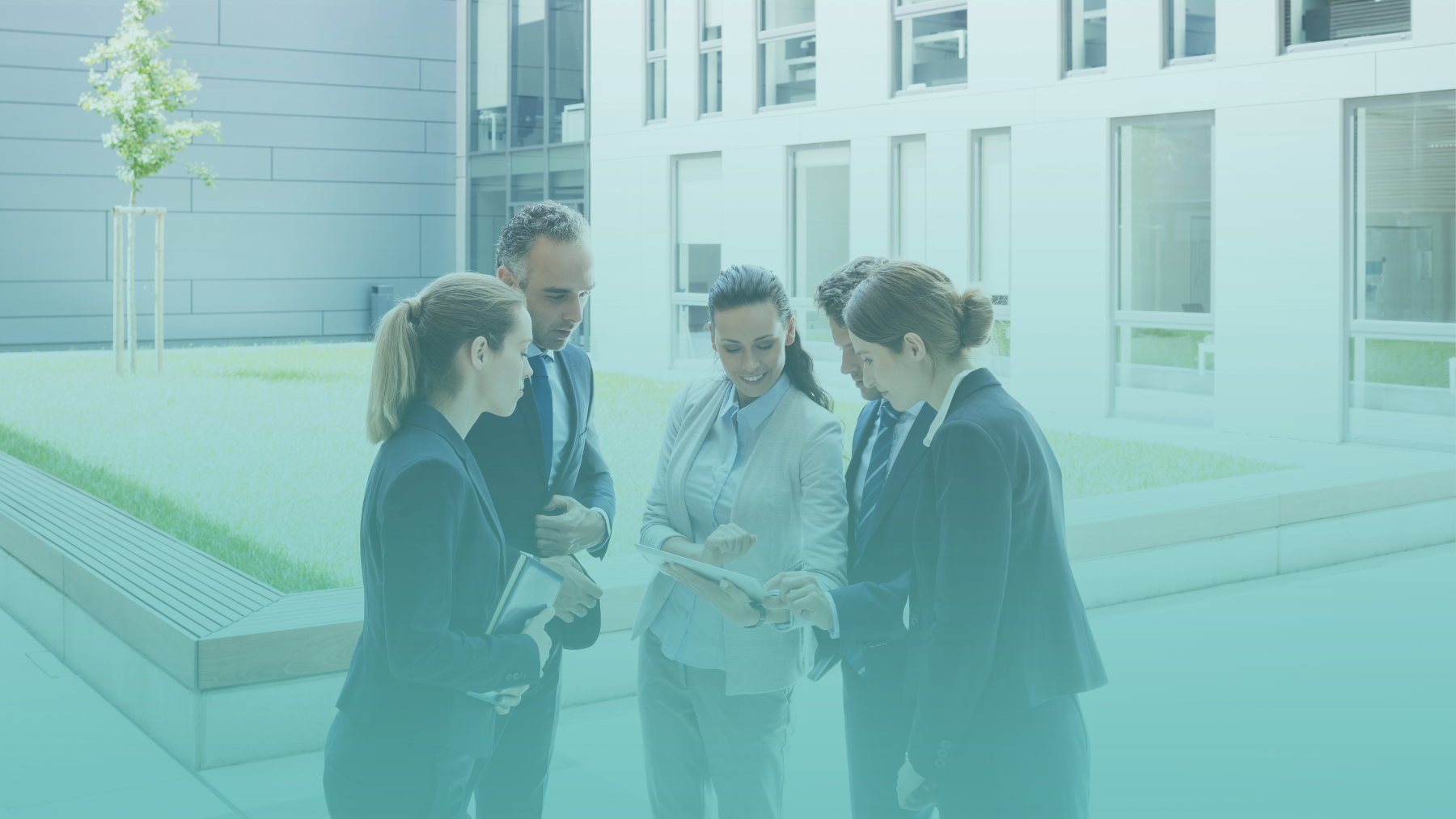 Commercial real estate brokers reviewing information together, representing AI search visibility and broker recommendations